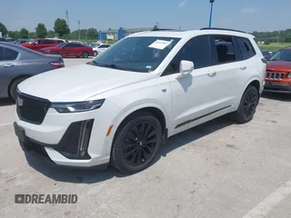 2021 Cadillac XT6 Sport with VIN 1GYKPGRS4MZ222263, listed as a IAAI auction lot 42443907 with 18,353 mi miles and . Bid and sale history available at DreamBid. Image 2.
