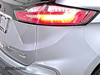 2020 Ford Edge Titanium with VIN 2FMPK3K95LBA30678, listed as a IAAI auction lot 42714178 with 60,935 mi miles and . Bid and sale history available at DreamBid. Image 1.