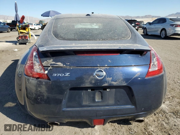 2014 Nissan 370Z Touring with VIN JN1AZ4EH6EM633394, listed as a Copart auction lot 74360354 with 0 mi miles and Salvage Title. Bid and sale history available at carsss.com. Image 6.