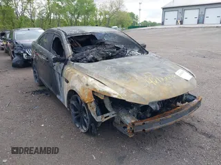 2015 Ford Taurus SHO z VIN 1FAHP2KT2FG186714, wystawiony jako IAAI lot #42182632 z przebiegiem Nie podano mil oraz . Historia ofert i sprzedaży dostępna na DreamBid. Obrazek 1.