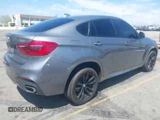 2018 BMW X6 xDrive35i z VIN 5UXKU2C51J0X50913, wystawiony jako IAAI lot #42078443 z przebiegiem Nie podano mil oraz . Historia ofert i sprzedaży dostępna na DreamBid. Obrazek 4.
