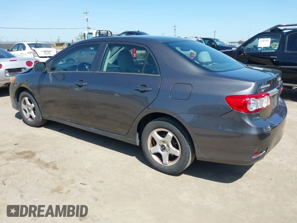 2012 Toyota Corolla L with VIN 5YFBU4EEXCP054988, listed as a IAAI auction lot 41973361 with 193,390 mi miles. Bid and sale history available at carsss.com. Image 3.
