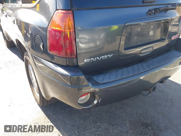 2006 GMC Envoy SLT with VIN 1GKDS13S962184712, listed as a IAAI auction lot 41250740 with 226,986 mi miles. Bid and sale history available at carsss.com. Image 12.