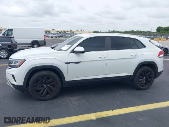 2023 Volkswagen Atlas SE with VIN 1V2JE2CA3PC227230, listed as a IAAI auction lot 42435466 with 86,217 mi miles and . Bid and sale history available at DreamBid. Image 14.