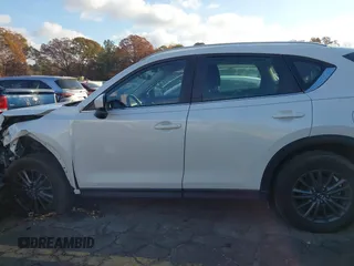 2020 Mazda CX-5 Sport with VIN JM3KFABMXL1824574, listed as a IAAI auction lot 41029057 with 47,760 mi miles. Bid and sale history available at carsss.com. Image 14.