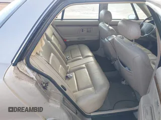 1996 Oldsmobile 98 Regency Elite Series I - 1SB z VIN 1G3CX52K6T4300949, wystawiony jako IAAI lot #42437137 z przebiegiem 152 687 mil mil oraz . Historia ofert i sprzedaży dostępna na DreamBid. Obrazek 8.
