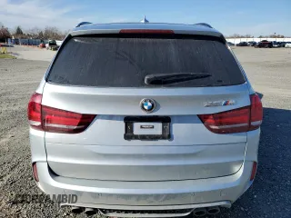 2017 BMW X5 M z VIN 5YMKT6C39H0X20537, wystawiony jako Copart lot #41470195 z przebiegiem 86 386 mil mil oraz Szkody całkowita. Historia ofert i sprzedaży dostępna na DreamBid. Obrazek 6.