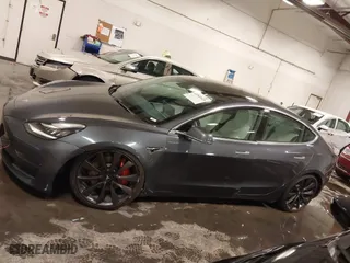 2020 Tesla Model 3 Performance with VIN 5YJ3E1EC3LF641768, listed as a IAAI auction lot 41542615 with 43,343 mi miles. Bid and sale history available at carsss.com. Image 15.