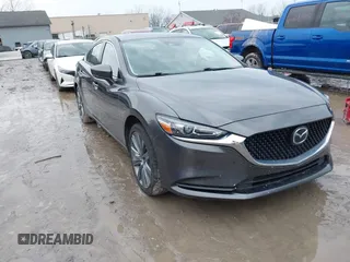 2020 Mazda 6 Grand Touring with VIN JM1GL1TYXL1524543, listed as a IAAI auction lot 41474337 with 52,160 mi miles and . Bid and sale history available at carsss.com. Image 1.