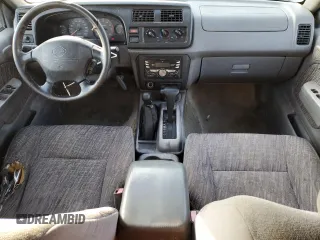2000 Nissan Frontier XE z VIN 1N6ED27Y2YC369211, wystawiony jako Copart lot #80594884 z przebiegiem 225 194 mil mil oraz Czysty tytuł • Clean title. Historia ofert i sprzedaży dostępna na DreamBid. Obrazek 8.