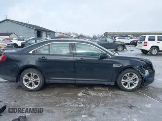 2013 Ford Taurus SEL with VIN 1FAHP2H80DG234999, listed as a IAAI auction lot 41577003 with 115,403 mi miles and . Bid and sale history available at DreamBid. Image 13.