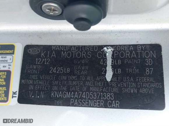 2013 Kia Optima LX with VIN KNAGM4A74D5371383, listed as a IAAI auction lot 41756449 with 133,002 mi miles. Bid and sale history available at carsss.com. Image 9.