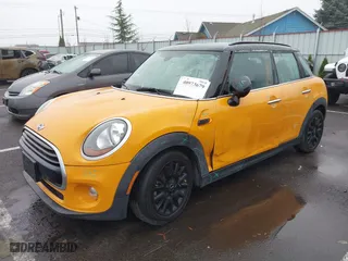 2018 MINI Hardtop 4 Door Cooper with VIN WMWXU1C59J2F79169, listed as a IAAI auction lot 40973679 with 97507 miles. Bid and sale history available at carsss.com. Image 18.