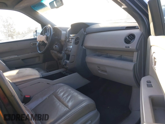 2012 Honda Pilot EX-L with VIN 5FNYF3H60CB035624, listed as a IAAI auction lot 41321568 with 309,545 mi miles and . Bid and sale history available at DreamBid. Image 5.