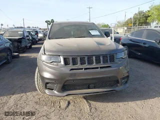 2015 Jeep Grand Cherokee SRT with VIN 1C4RJFDJ9FC842448, listed as a IAAI auction lot 41850385 with 178,439 mi miles. Bid and sale history available at carsss.com. Image 6.