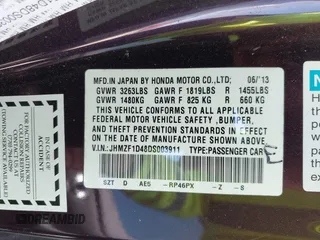 2013 Honda CR-Z with VIN JHMZF1D48DS003911, listed as a IAAI auction lot 41886836 with 156,542 mi miles. Bid and sale history available at carsss.com. Image 9.
