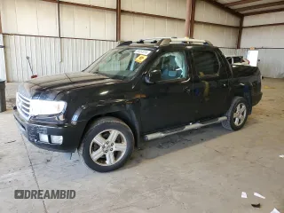 2013 Honda Ridgeline RTL with VIN 5FPYK1F50DB015599, listed as a Copart auction lot 50852074 with 159,411 mi miles and Salvage Title. Bid and sale history available at carsss.com. Image 1.