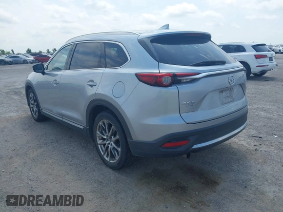 2016 Mazda CX-9 Signature with VIN JM3TCBEY9G0117785, listed as a IAAI auction lot 42331883 with 115,096 mi miles and . Bid and sale history available at DreamBid. Image 3.