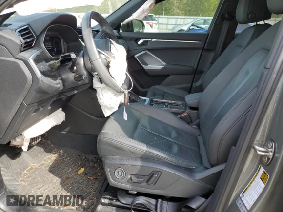 2021 Audi Q3 S line Premium with VIN WA1DECF33M1082709, listed as a Copart auction lot 50559005 with 65,244 mi miles and Salvage Title. Bid and sale history available at DreamBid. Image 7.