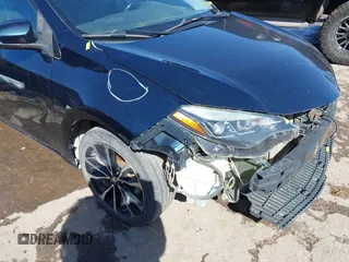 2017 Toyota Corolla L z VIN 5YFBURHE0HP721258, wystawiony jako IAAI lot #41706824 z przebiegiem 158 554 mil mil oraz . Historia ofert i sprzedaży dostępna na DreamBid. Obrazek 20.