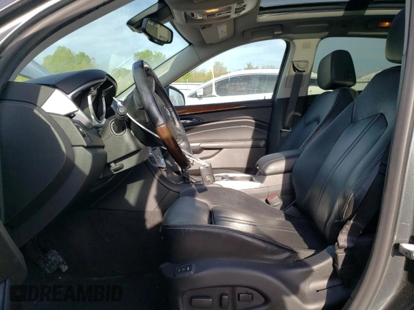 2012 Cadillac SRX Performance Collection z VIN 3GYFNBE3XCS611543, wystawiony jako Copart lot #56628975 z przebiegiem 61 825 mil mil oraz Szkoda całkowita • Salvage title. Historia ofert i sprzedaży dostępna na DreamBid. Obrazek 7.