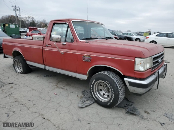 1988 Ford 1/2 Ton Trucks with VIN 1FTDF15Y5JLA36545, listed as a Copart auction lot 82768994 with 518,107 mi miles and Salvage Title. Bid and sale history available at carsss.com. Image 4.