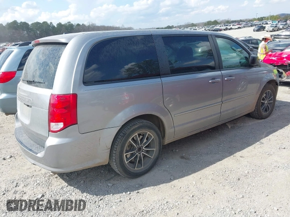 2015 Dodge Grand Caravan American Value with VIN 2C4RDGBG6FR576897, listed as a IAAI auction lot 41780897 with 159,823 mi miles and . Bid and sale history available at DreamBid. Image 4.