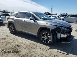 2020 Lexus RX with VIN 2T2HGMDA4LC044999, listed as a Copart auction lot 48300015 with 112,483 mi miles and Salvage Title. Bid and sale history available at carsss.com. Image 4.