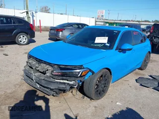 2022 Honda Civic Sport Touring z VIN 19XFL1H88NE014194, wystawiony jako IAAI lot #41212490 z przebiegiem 69 061 mil mil oraz . Historia ofert i sprzedaży dostępna na DreamBid. Obrazek 2.