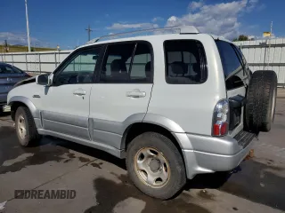 2005 Suzuki Grand Vitara LX z VIN JS3TD62V854201465, wystawiony jako Copart lot #61460344 z przebiegiem 204 784 mil mil oraz Szkoda całkowita • Salvage title. Historia ofert i sprzedaży dostępna na DreamBid. Obrazek 2.