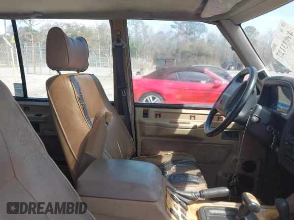 1995 Land Rover Range Rover with VIN SALHC1341SA656552, listed as a IAAI auction lot 41833127 with 129,235 mi miles and . Bid and sale history available at DreamBid. Image 5.