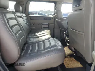 2003 Hummer H2 z VIN 5GRGN23U33H121992, wystawiony jako Copart lot #50388175 z przebiegiem 237 169 mil mil oraz Czysty tytuł • Clean title. Historia ofert i sprzedaży dostępna na DreamBid. Obrazek 11.