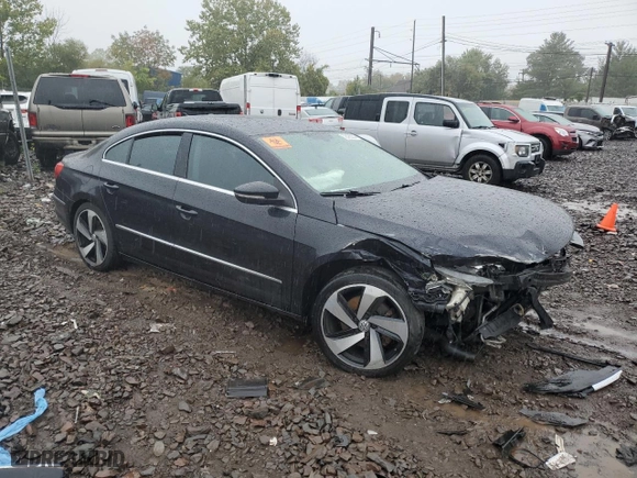 2010 Volkswagen CC Luxury with VIN WVWHP7AN8AE551637, listed as a Copart auction lot 72438004 with NaN miles and Salvage Title. Bid and sale history available at carsss.com. Image 4.