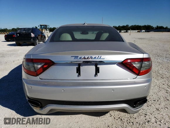 2013 Maserati GranTurismo Sport with VIN ZAM45VLA8D0067421, listed as a Copart auction lot 69464472 with Not provided miles and Salvage title. Bid and sale history available at DreamBid. Image 6.