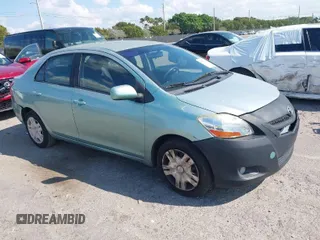 2008 Toyota Yaris with VIN JTDBT923384015057, listed as a IAAI auction lot 41879099 with 184,995 mi miles. Bid and sale history available at carsss.com. Image 1.