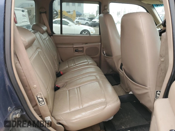 2000 Ford Explorer Eddie Bauer with VIN 1FMZU74E4YZA75510, listed as a Copart auction lot 75601964 with 196,180 mi miles and Salvage title. Bid and sale history available at DreamBid. Image 10.
