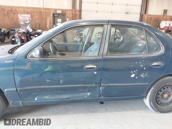 1996 Nissan Altima XE with VIN 1N4BU31D4TC139105, listed as a IAAI auction lot 40241213 with 115,817 mi miles and . Bid and sale history available at DreamBid. Image 6.