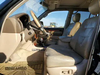 2000 Lexus LX 470 z VIN JT6HT00W3Y0090164, wystawiony jako Copart lot #41338515 z przebiegiem 209 338 mil mil oraz Szkoda całkowita • Salvage title. Historia ofert i sprzedaży dostępna na DreamBid. Obrazek 7.