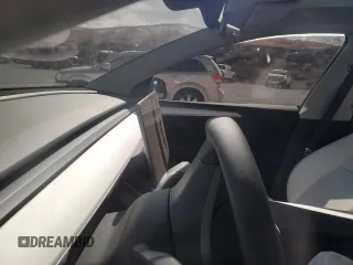 2024 Tesla Model Y Performance z VIN 7SAYGDEF6RF166365, wystawiony jako Copart lot #48885585 z przebiegiem Nie podano mil oraz Szkoda całkowita • Salvage title. Historia ofert i sprzedaży dostępna na DreamBid. Obrazek 9.