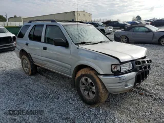 2001 Isuzu Rodeo S with VIN 4S2CK58W114317183, listed as a Copart auction lot 76280974 with 318,201 mi miles and Non Repairable. Bid and sale history available at DreamBid. Image 4.