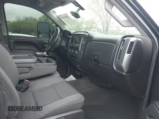 2014 Chevrolet Silverado 1500 LT with VIN 1GCVKREC4EZ327320, listed as a IAAI auction lot 42063939 with 132,317 mi miles and . Bid and sale history available at DreamBid. Image 5.