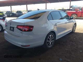 2017 Volkswagen Jetta SE with VIN 3VWDB7AJ9HM286612, listed as a IAAI auction lot 42721128 with 143,458 mi miles and . Bid and sale history available at DreamBid. Image 4.