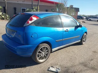 2002 Ford Focus ZX3 with VIN 3FAFP31322R191963, listed as a IAAI auction lot 41060876 with 81,916 mi miles and . Bid and sale history available at DreamBid. Image 4.