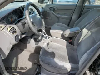2002 Ford Focus LX with VIN 1FAFP33P72W239485, listed as a Copart auction lot 73323084 with 94,876 mi miles and Non Repairable. Bid and sale history available at DreamBid. Image 7.