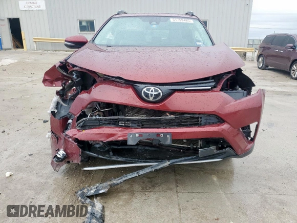 2018 Toyota RAV4 XLE with VIN 2T3WFREV7JW429781, listed as a Copart auction lot 51759485 with 72,792 mi miles and Salvage Title. Bid and sale history available at DreamBid. Image 5.