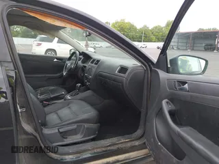 2012 Volkswagen Jetta SE with VIN 3VWDX7AJ4CM414622, listed as a IAAI auction lot 42681807 with 195,821 mi miles and . Bid and sale history available at DreamBid. Image 5.