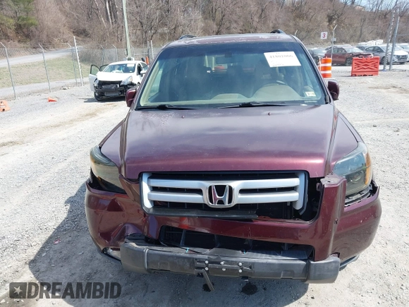 2007 Honda Pilot EX-L with VIN 5FNYF18587B021312, listed as a IAAI auction lot 41801006 with 261,842 mi miles. Bid and sale history available at carsss.com. Image 6.