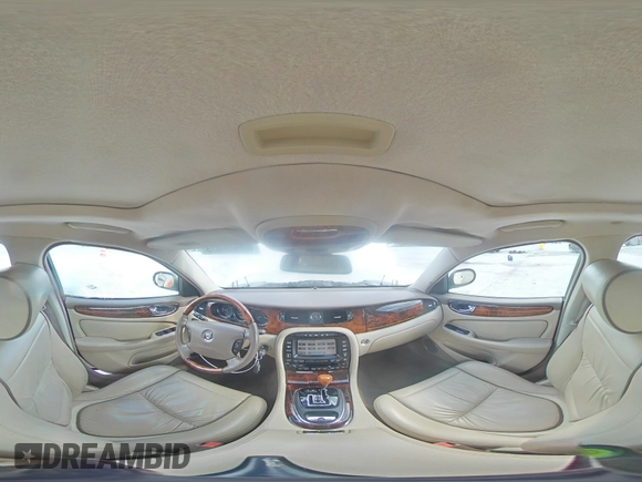 2006 Jaguar XJ Vanden Plas with VIN SAJWA82B16SH06996, listed as a Copart auction lot 62509025 with 80,236 mi miles and Salvage title. Bid and sale history available at DreamBid. Image 14.