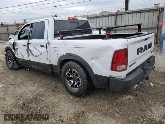2018 Ram 1500 Rebel with VIN 1C6RR7YT7JS235965, listed as a Copart auction lot 84749674 with 61,484 mi miles and Salvage title. Bid and sale history available at DreamBid. Image 2.