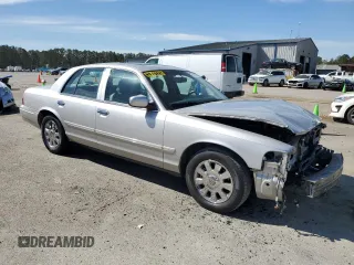 2008 Mercury Grand Marquis z VIN 2MHHM75VX8X604576, wystawiony jako Copart lot #49605405 z przebiegiem 142 553 mil mil oraz Szkoda całkowita • Salvage title. Historia ofert i sprzedaży dostępna na DreamBid. Obrazek 4.